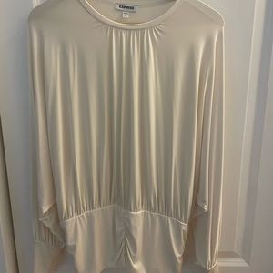 Beautiful gently used long sleeves Draped Crew Neck Pleated Banded Bottom Top